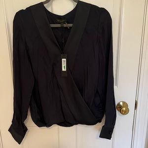 Donna Karan faux wrap top navy with black silk trim. NWT size L
